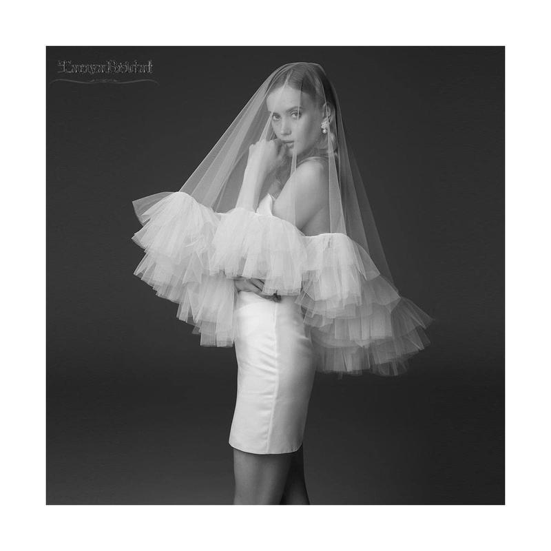 Fryzury ślubne z welonem